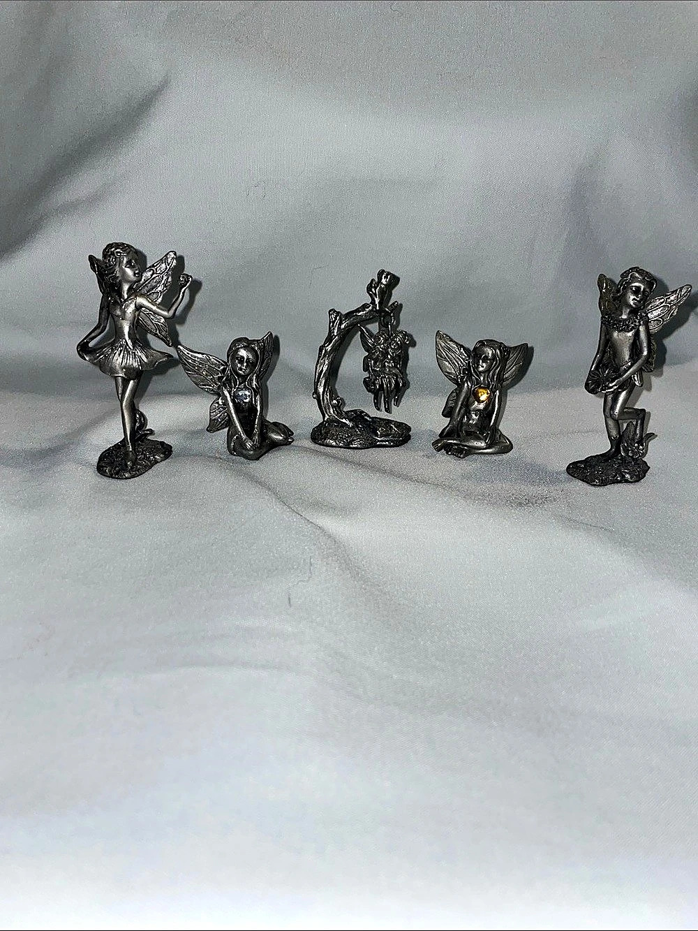 Five silver Figurine Decor Set